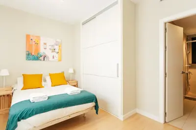 Cama o camas de una habitación en Alohamundi Dúplex Alameda