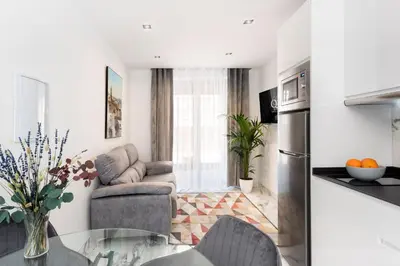 Una cocina o zona de cocina en Apartamentos Casa del Arco de 2 a 6 personas