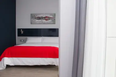 Cama o camas de una habitación en Hotel Santa Eulalia