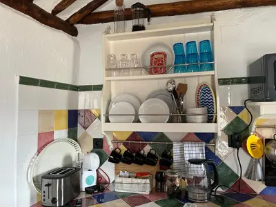 Una cocina o zona de cocina en Las casillas de la Villa ALEGRÍAS