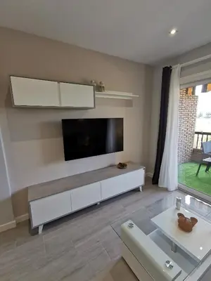 Una televisión o centro de entretenimiento en Las mejores vistas de Cordoba con parking privado gratuito