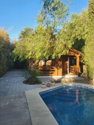 Piscina en o cerca de Casa Madera Urbanizacion Socorro