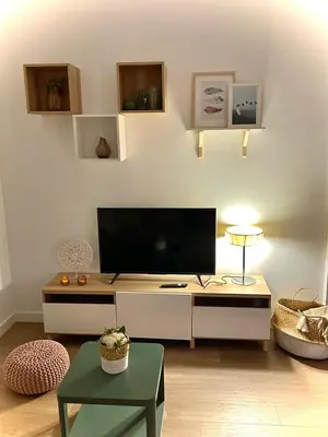 Una televisión o centro de entretenimiento en Apartamento en casco histórico de Córdoba/piscina