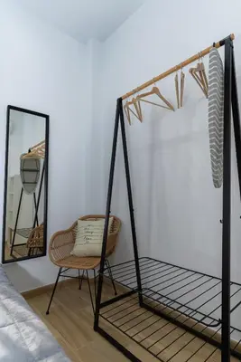 Cama o camas de una habitación en Córdoba Suites Apartments