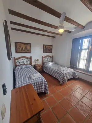 Cama o camas de una habitación en Finca Rural La Cañera 16 huéspedes