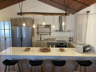Una cocina o zona de cocina en Casa rural La Alcaparra