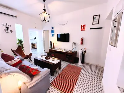 Una televisión o centro de entretenimiento en Munigua House