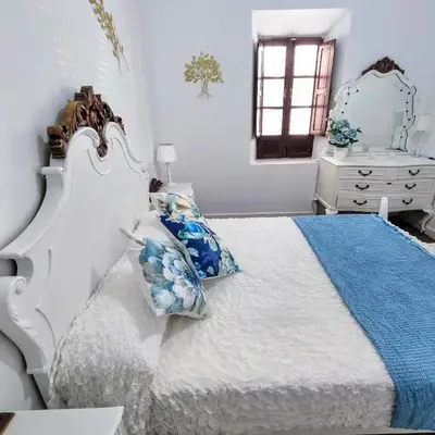Munigua House