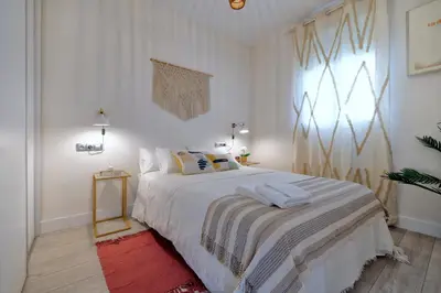Cama o camas de una habitación en Apartamento cerca de la MEZQUITA DE CORDOBA & FREE PRIVATE PARKING