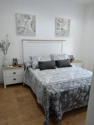 Cama o camas de una habitación en APARTAMENTO EL LLANO