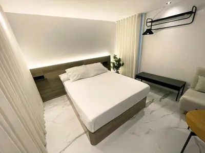 Cama o camas de una habitación en Apartamentos Turísticos Córdoba Boutique Con jacuzzi