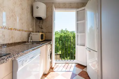 Una cocina o zona de cocina en Sevillano apto en Centro cerca de Santa Justa