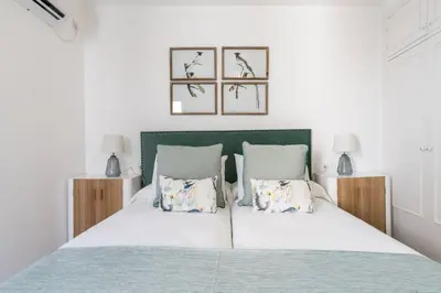 Cama o camas de una habitación en BeHouse Alfalfa