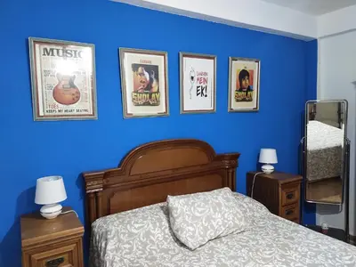 Cama o camas de una habitación en An Indian Bollywood Sevilla Experience - for families, couples & business trips