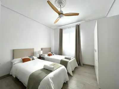 Cama o camas de una habitación en Apartamento el Arcángel de Córdoba