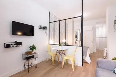 Una televisión o centro de entretenimiento en Loft en Centro Histórico con bicis gratis