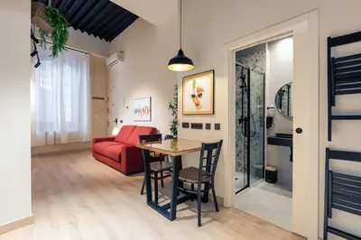 Cama o camas de una habitación en Berenguela Setas Lofts