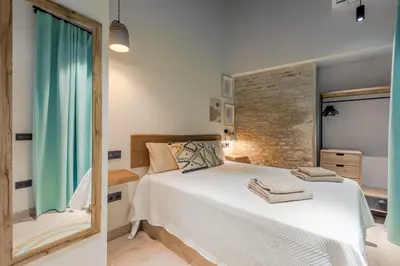 Cama o camas de una habitación en Berenguela Setas Lofts