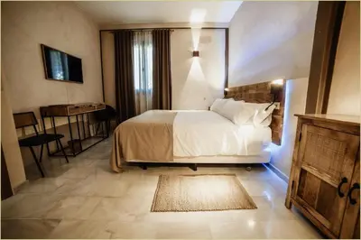 Cama o camas de una habitación en LA POSADA DEL LIMONERO