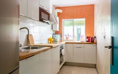 Una cocina o zona de cocina en Colours Apartment and Garage Historical Center 4 pax