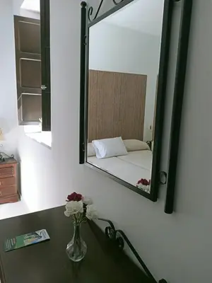 Cama o camas de una habitación en Estación de Coripe