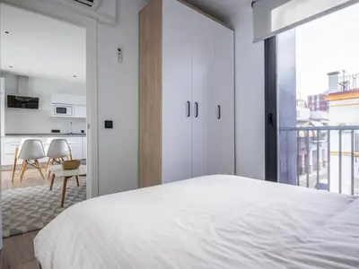 Cama o camas de una habitación en Nervión Suites 2 - Vacacional Sevilla