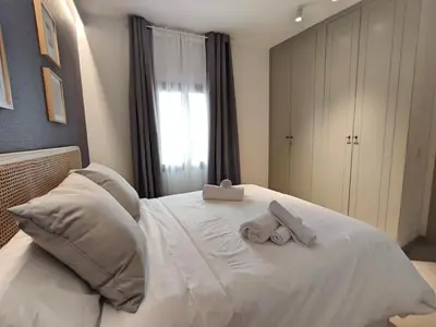 Cama o camas de una habitación en Alojamiento San Basilio Suite