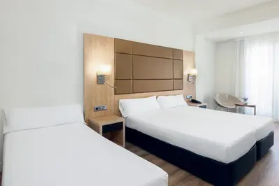 Cama o camas de una habitación en Virgen de los Reyes
