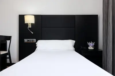 Cama o camas de una habitación en Virgen de los Reyes