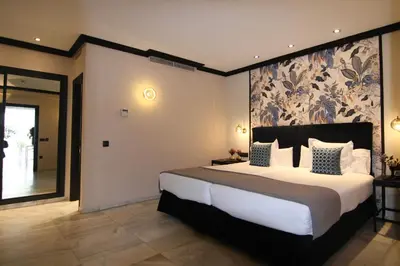 Cama o camas de una habitación en Hotel San Gil