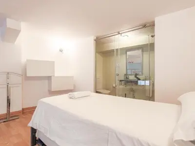 Cama o camas de una habitación en Macarena Apartment Seville Center Parking Free