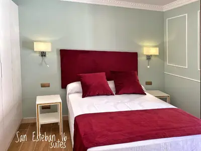 Cama o camas de una habitación en SUITES SAN ESTEBAN 16 Principe