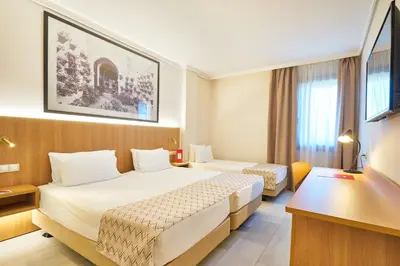 Cama o camas de una habitación en Exe Ciudad de Córdoba