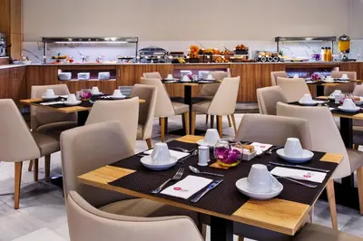 Un restaurante o sitio para comer en Exe Ciudad de Córdoba