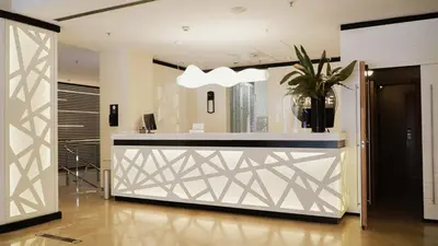 El vestíbulo o zona de recepción de Vértice Sevilla