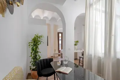 Zona de estar de Coliseum Boutique Apartments