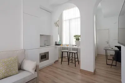Una cocina o zona de cocina en Coliseum Boutique Apartments