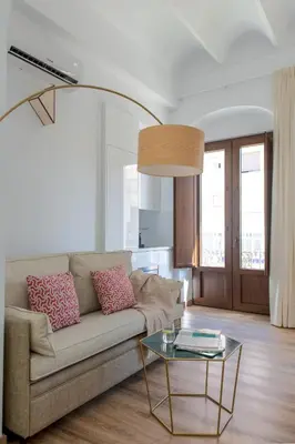 Zona de estar de Coliseum Boutique Apartments