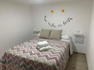 Cama o camas de una habitación en La Vida es Bella