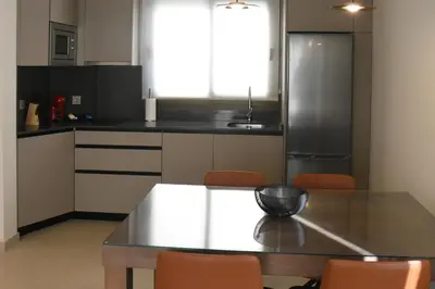 Una cocina o zona de cocina en APTOS MILLÁN