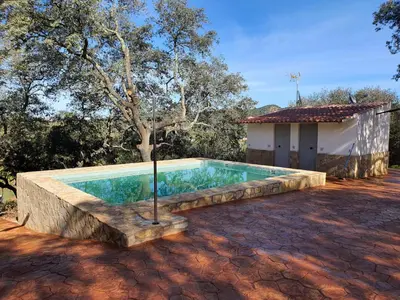 Piscina en o cerca de La Casa de Madera
