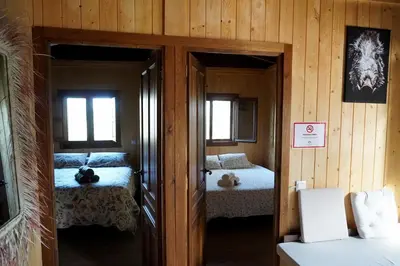 Cama o camas de una habitación en La Casa de Madera