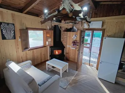 Zona de estar de La Casa de Madera