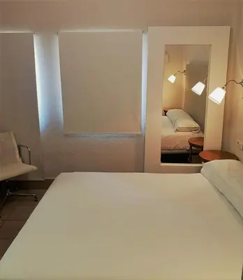 Cama o camas de una habitación en Hotel Oromana