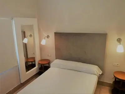Cama o camas de una habitación en Hotel Oromana