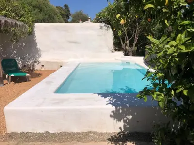 Piscina en o cerca de Casa Cueva El Naranjo Rocabella