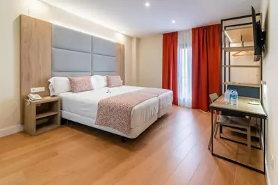 Cama o camas de una habitación en Hotel Selu