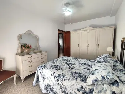 Cama o camas de una habitación en Apartamento La Muralla de San Lorenzo