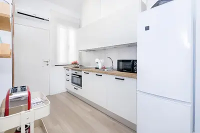 Una cocina o zona de cocina en BHost - Yaya María