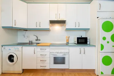 Una cocina o zona de cocina en CR ALAMEDA Amplio y Traquilo apartameto para parejas